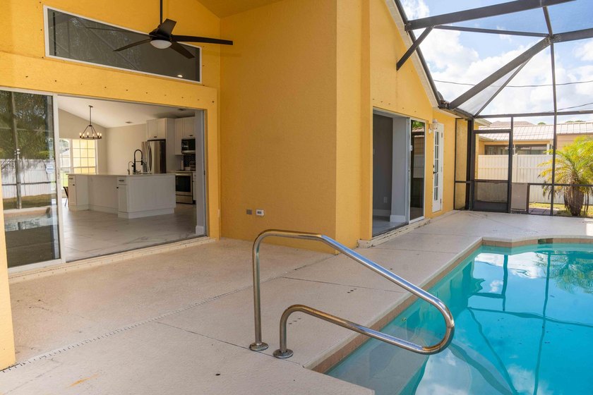 Discover this amazing home Pool home featuring 3 bedrooms, 2 - photo 19