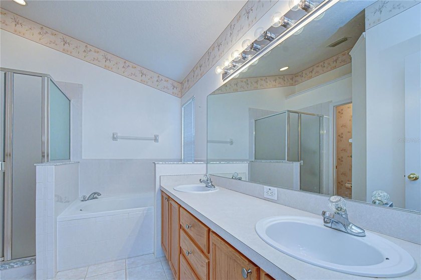Virtually Staged. Welcome to 18927 Twinberry Drive, a charming - photo 22