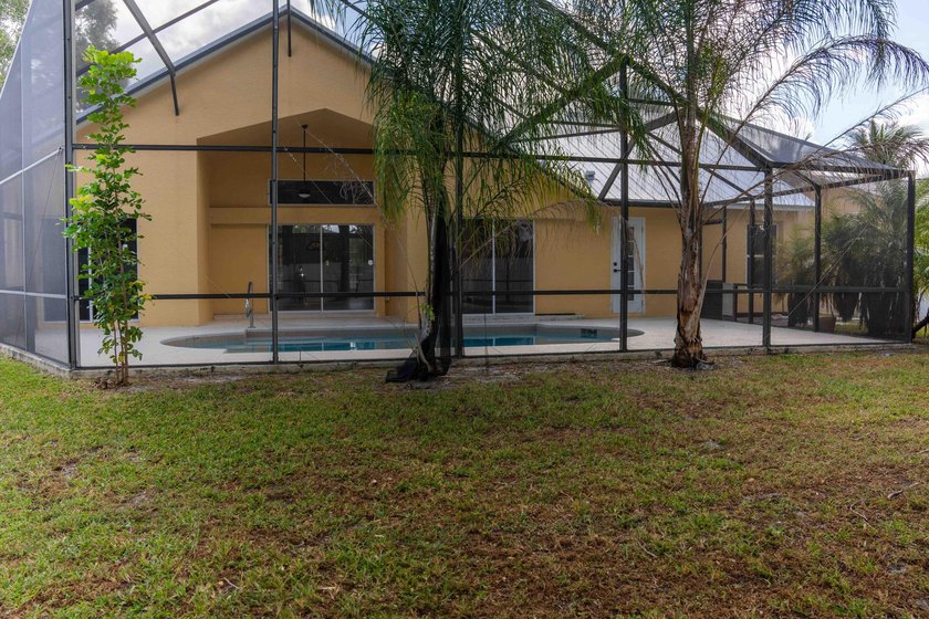 Discover this amazing home Pool home featuring 3 bedrooms, 2 - photo 24
