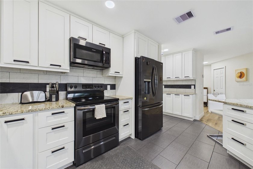 Beautifully Renovated Waterfront Home with Direct Canal Access - - photo 8