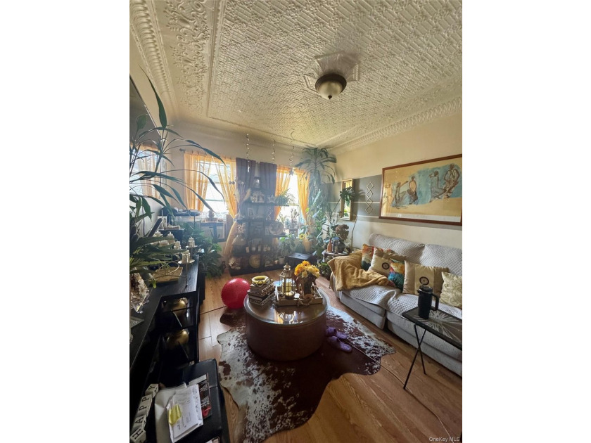 Welcome to this solid brick two-family home located in the heart - photo 12