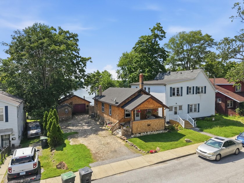 Lakefront Retreat on Lake George - Full of Charm &amp; Opportunity! - photo 2