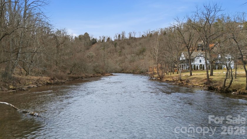 Embrace the mountain river lifestyle in the sought-after - photo 10