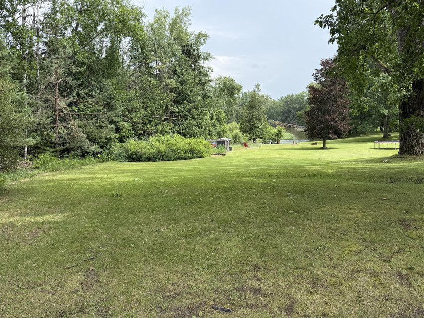 This beautiful property offers over 260 feet on the Thunder Bay - photo 4
