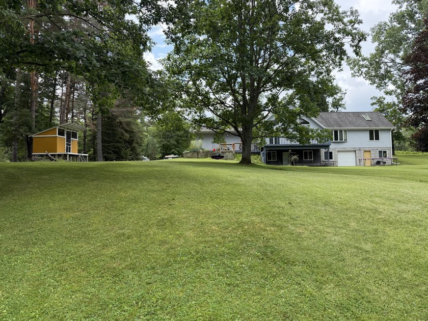 This beautiful property offers over 260 feet on the Thunder Bay - photo 5