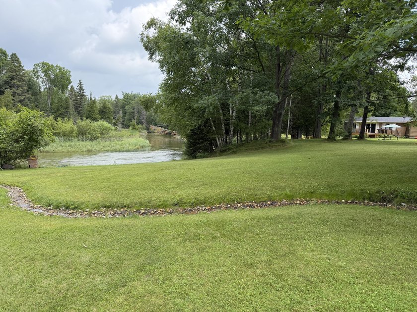 This beautiful property offers over 260 feet on the Thunder Bay - photo 6