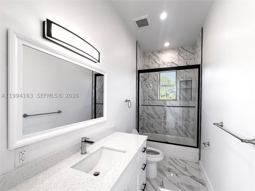 **NEW CONSTRUCTION** Stunning Brand-New 4Bedroom, 3Bathroom Home - photo 57