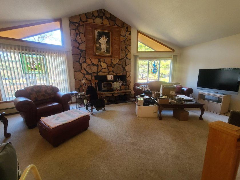 Take a look at this 3 bedroom 2 1/2 bath home. Sitting on just - photo 2