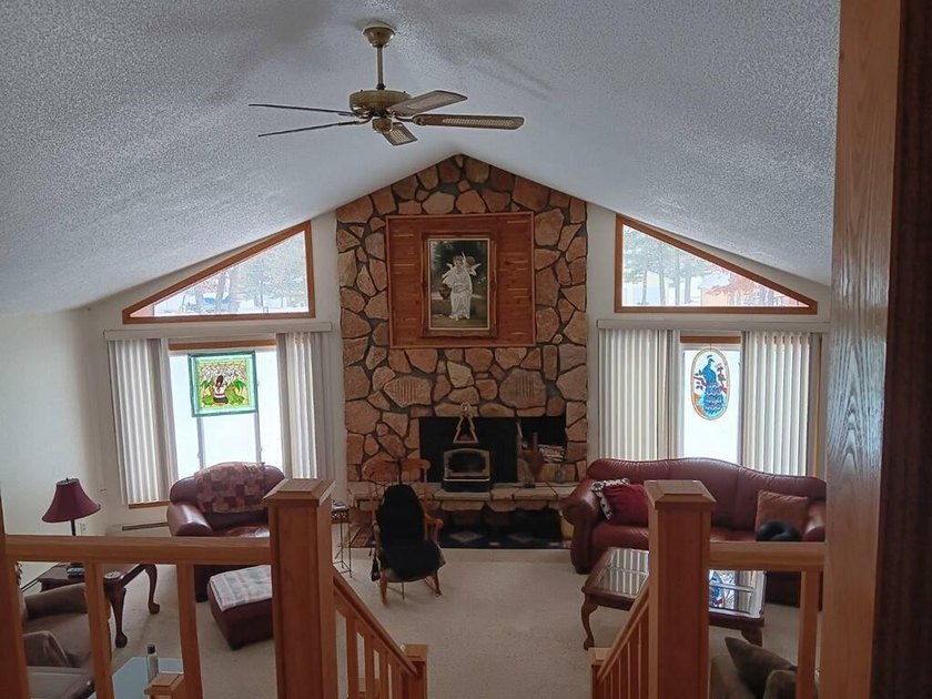 Take a look at this 3 bedroom 2 1/2 bath home. Sitting on just - photo 3