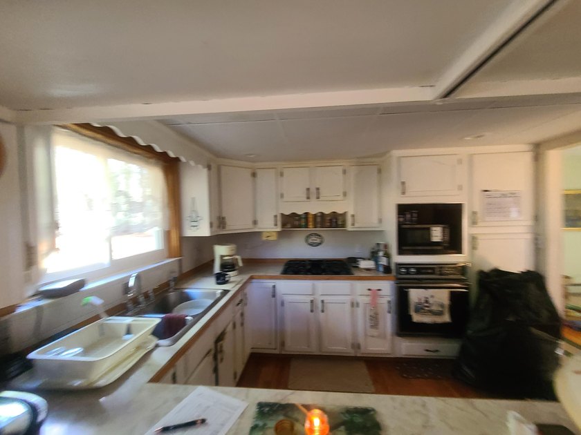 Take a look at this 3 bedroom 2 1/2 bath home. Sitting on just - photo 6