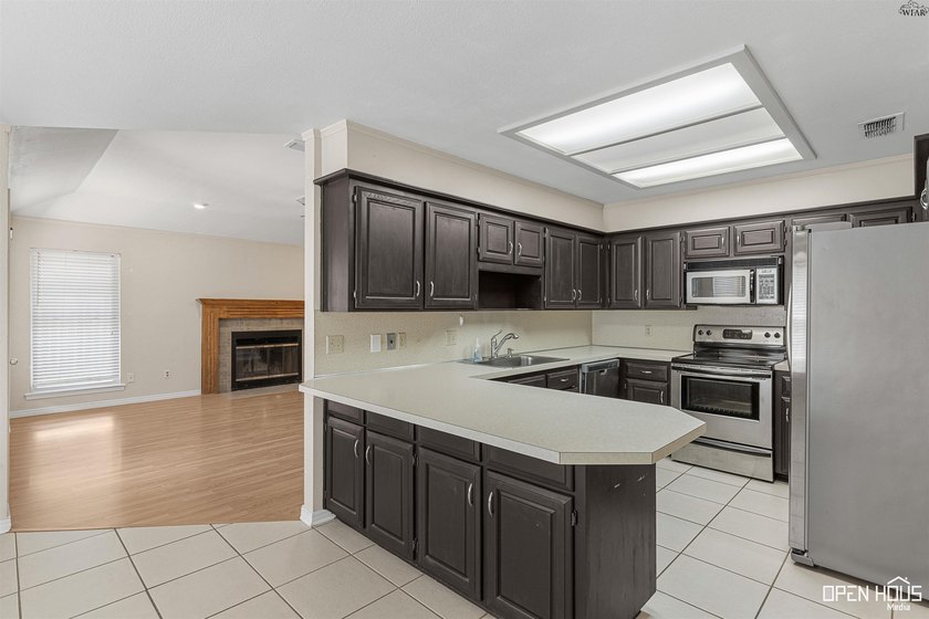 Welcome to this charming 3-bedroom, 2-bath home in the highly - photo 11