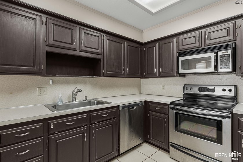 Welcome to this charming 3-bedroom, 2-bath home in the highly - photo 12