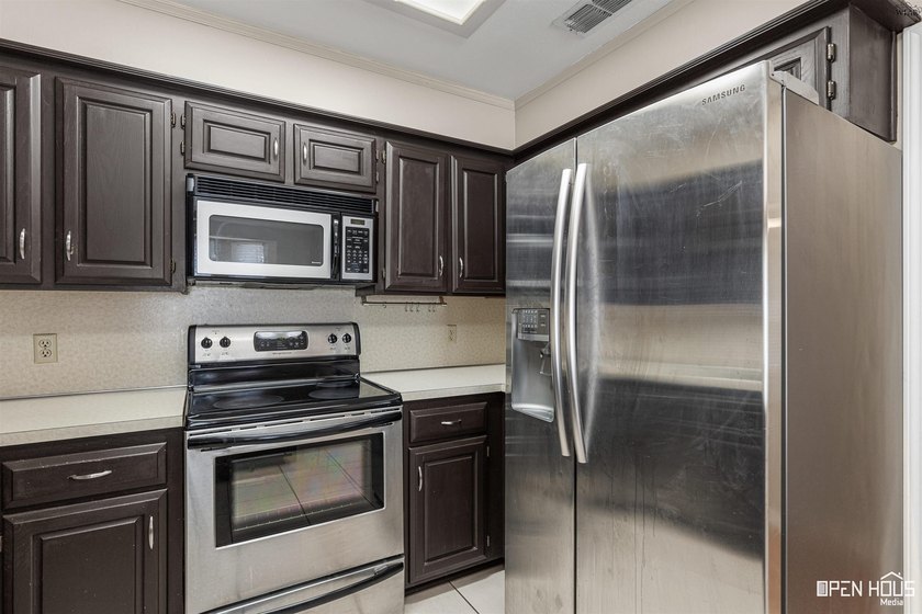 Welcome to this charming 3-bedroom, 2-bath home in the highly - photo 13