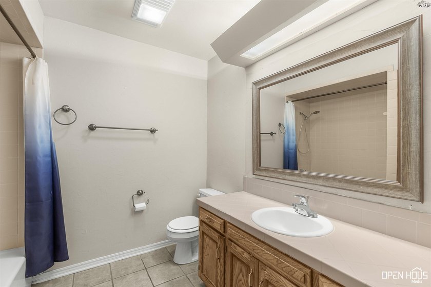 Welcome to this charming 3-bedroom, 2-bath home in the highly - photo 23