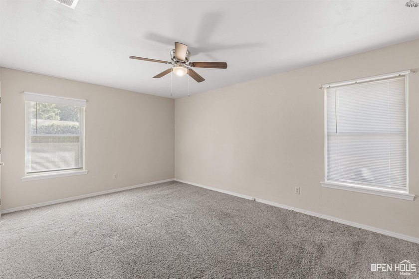 Welcome to this charming 3-bedroom, 2-bath home in the highly - photo 25