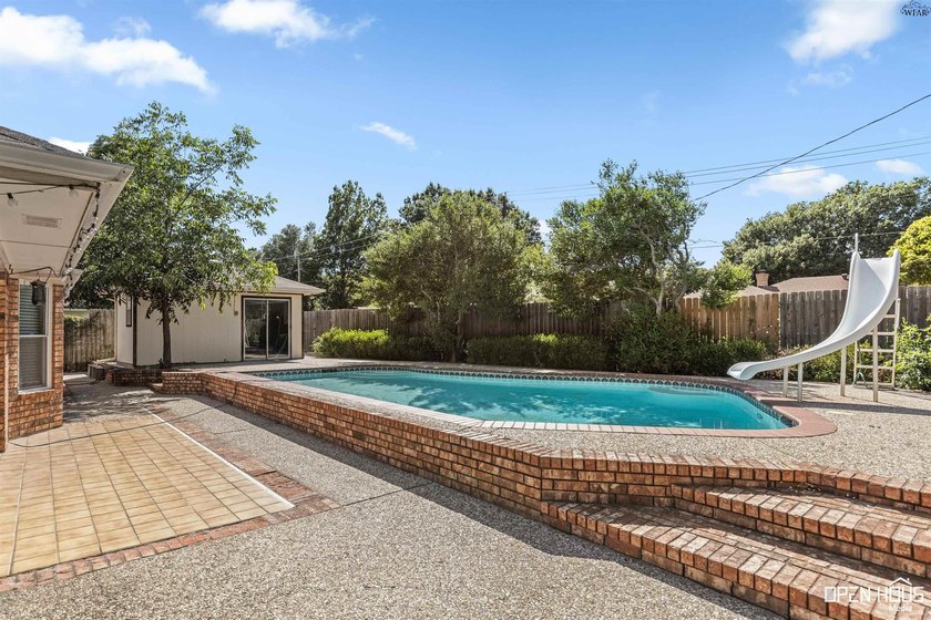 Welcome to this charming 3-bedroom, 2-bath home in the highly - photo 29
