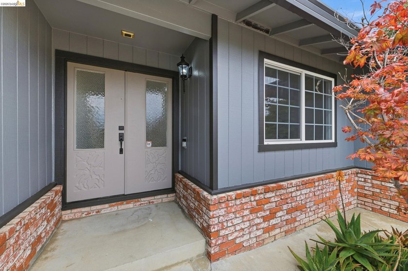 Welcome to this impeccably remodeled home in the highly - photo 3