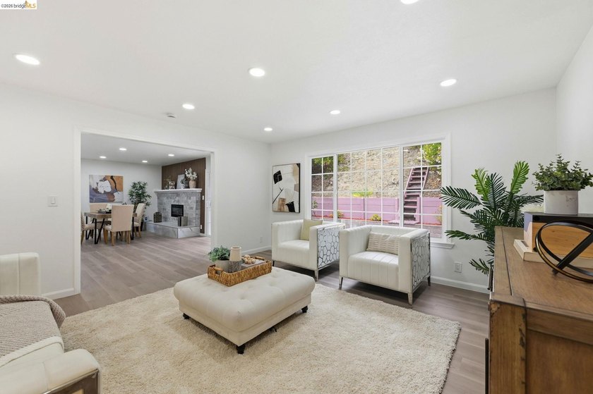 Welcome to this impeccably remodeled home in the highly - photo 6