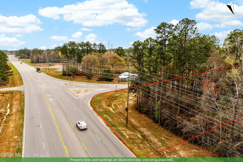 COMMERCIAL POTENTIAL. Positioned on a highly visible corner at a - photo 9