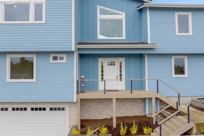 Contemporary coastal luxury awaits in this exceptional - photo 3