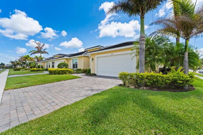 Beautifully maintained and loaded with upgrades, this 3-bedroom - photo 2