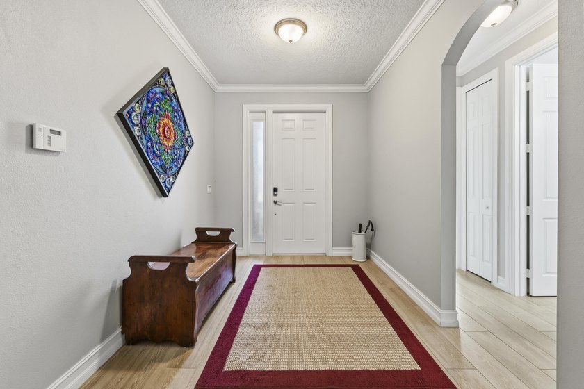 Beautifully maintained and loaded with upgrades, this 3-bedroom - photo 3