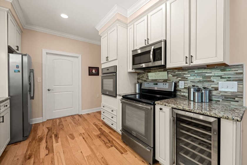 Set in sought-after Merifield Acres, this custom contemporary - photo 7