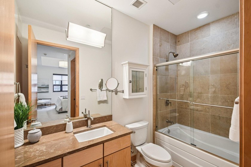 Step into effortless downtown living in this beautifully - photo 14