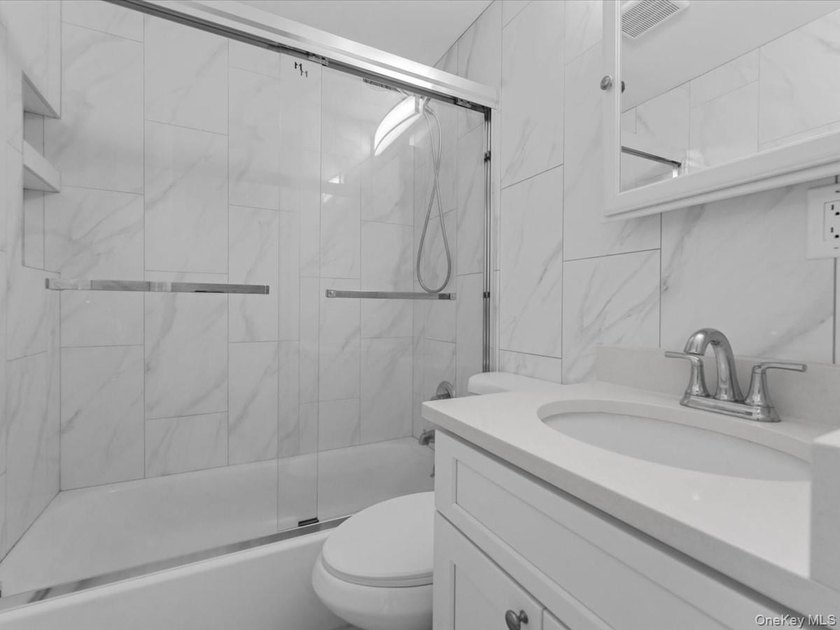 Welcome to this fully renovated ranch-style residence in the - photo 15