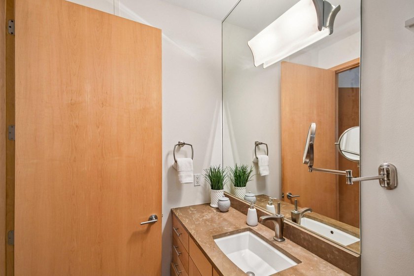 Step into effortless downtown living in this beautifully - photo 16