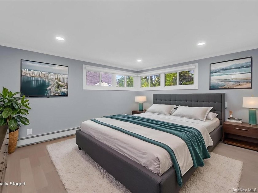 Welcome to this fully renovated ranch-style residence in the - photo 17