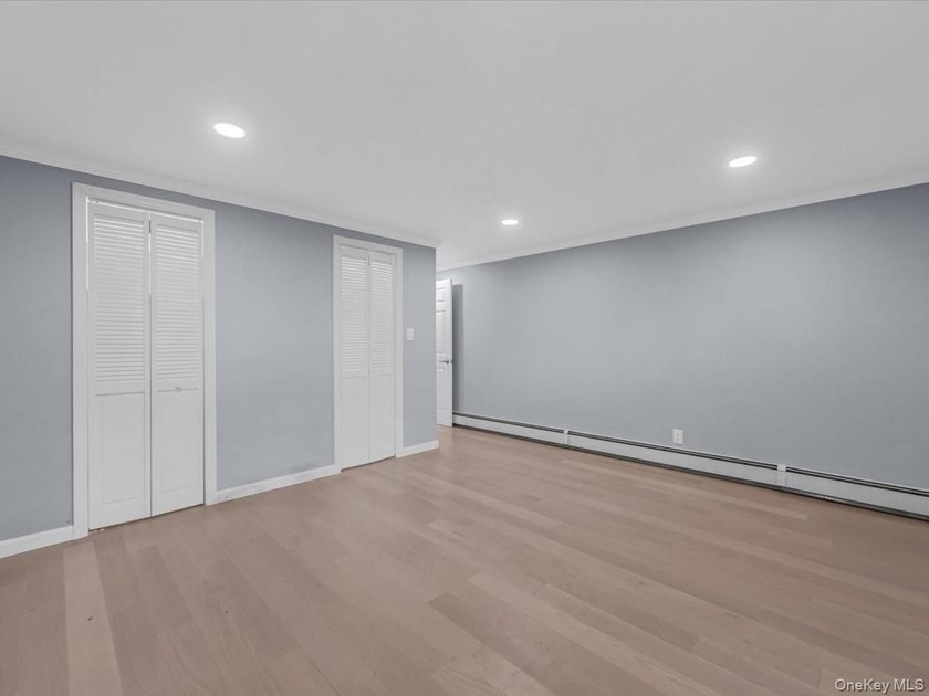 Welcome to this fully renovated ranch-style residence in the - photo 18