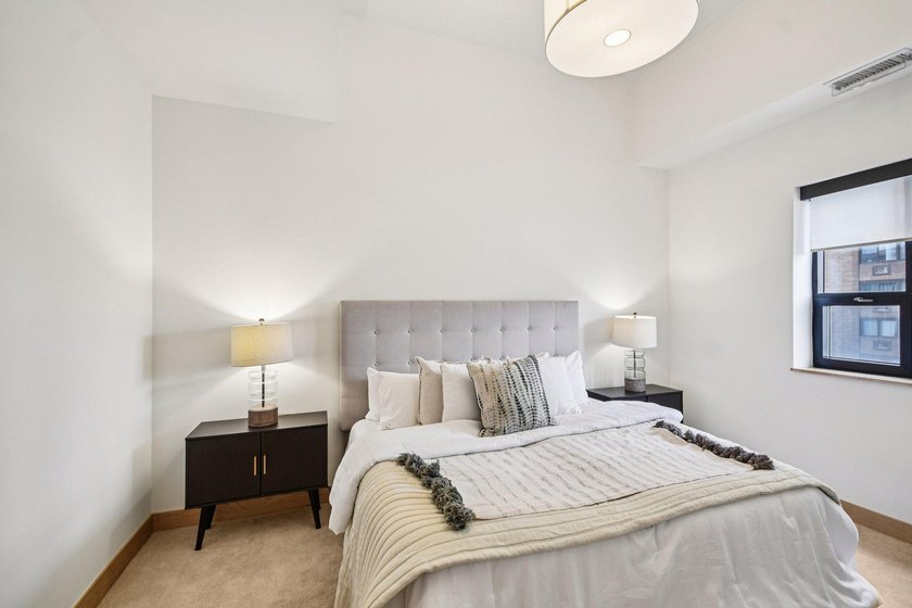 Step into effortless downtown living in this beautifully - photo 18