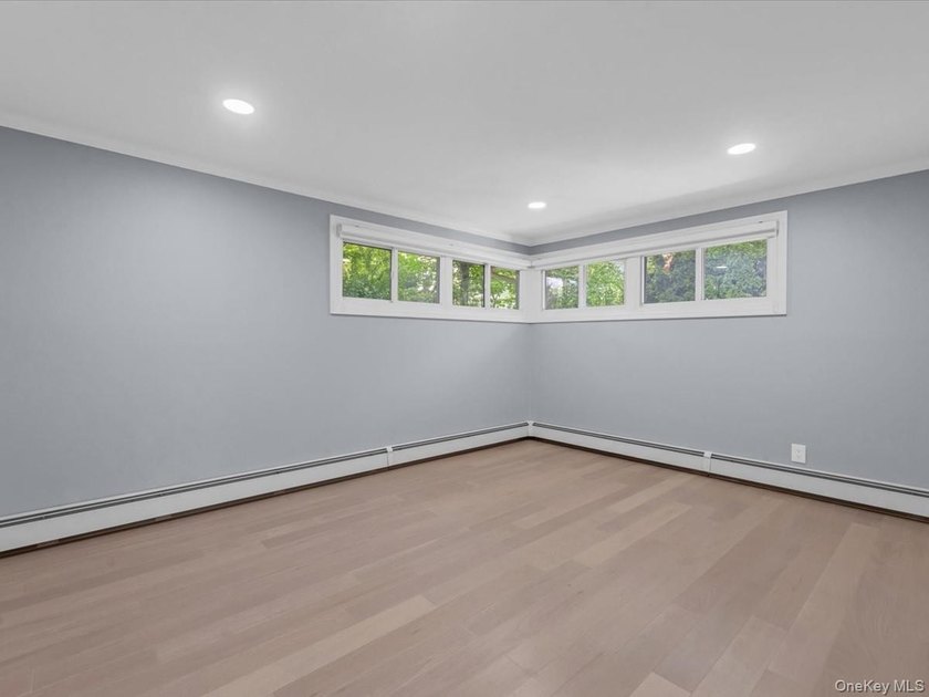Welcome to this fully renovated ranch-style residence in the - photo 20