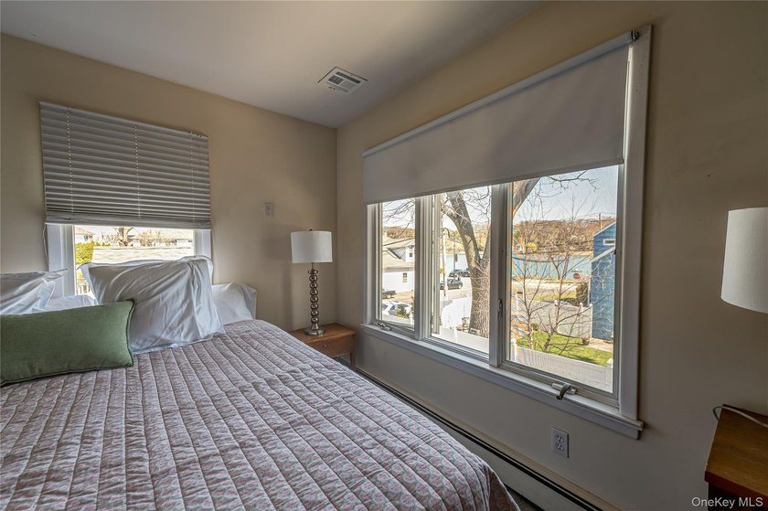 Stunning water views! This 4 bedroom, 2 full bath Colonial is - photo 22