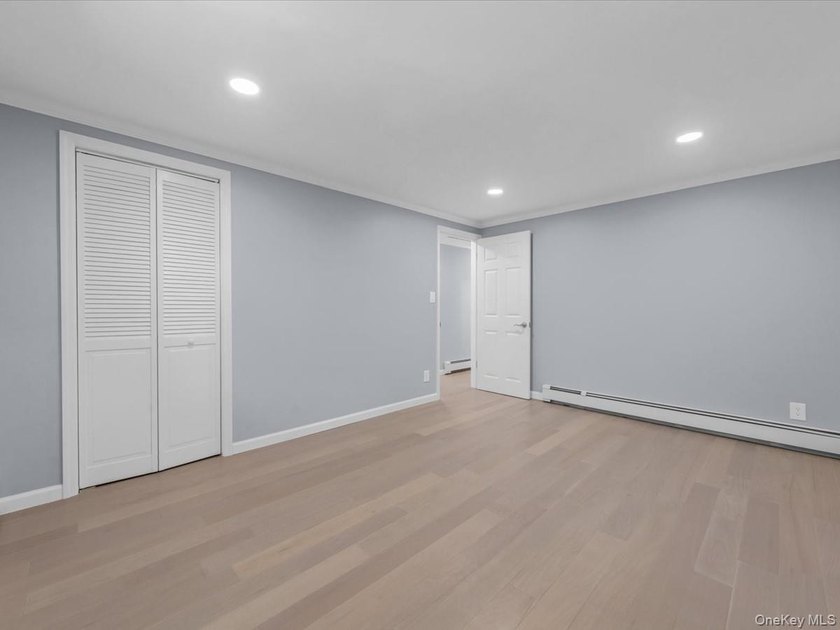 Welcome to this fully renovated ranch-style residence in the - photo 22