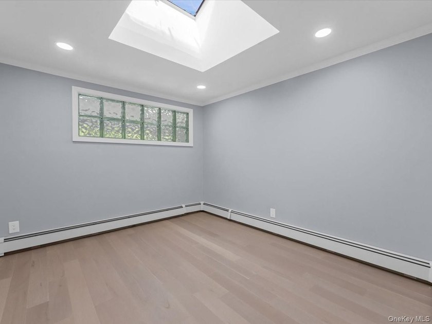 Welcome to this fully renovated ranch-style residence in the - photo 23