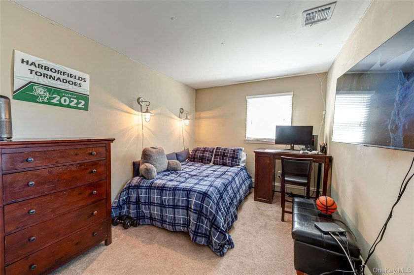 Stunning water views! This 4 bedroom, 2 full bath Colonial is - photo 24