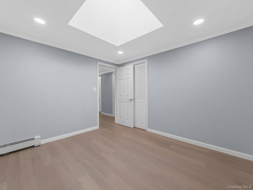 Welcome to this fully renovated ranch-style residence in the - photo 25