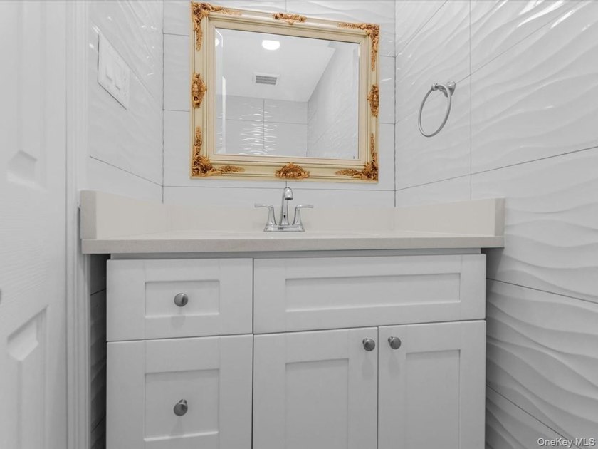 Welcome to this fully renovated ranch-style residence in the - photo 27