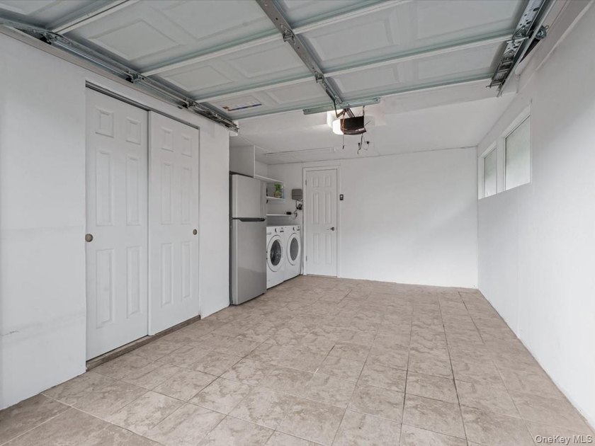 Welcome to this fully renovated ranch-style residence in the - photo 29