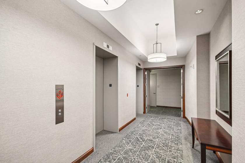 Step into effortless downtown living in this beautifully - photo 30