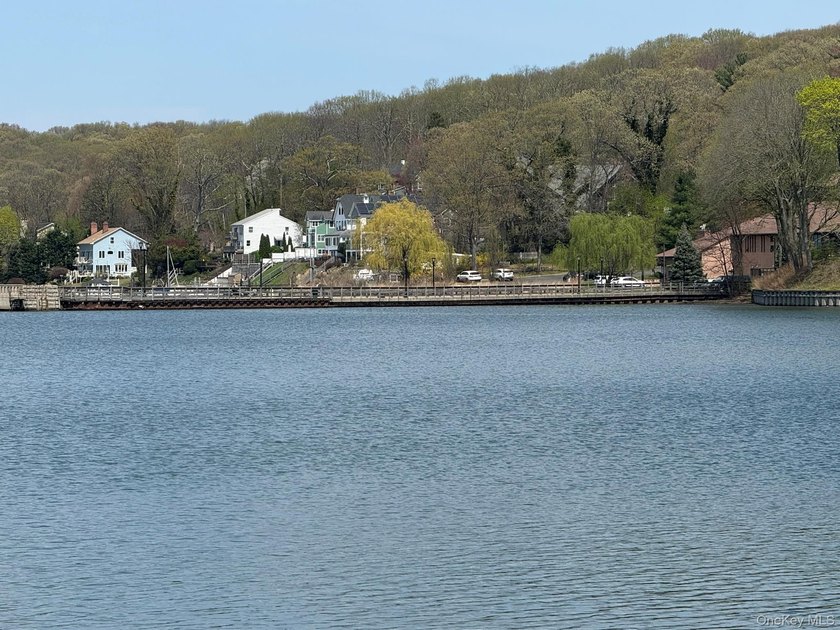 Stunning water views! This 4 bedroom, 2 full bath Colonial is - photo 32