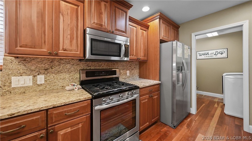 This fully furnished lakefront home is perfect for full-time - photo 12
