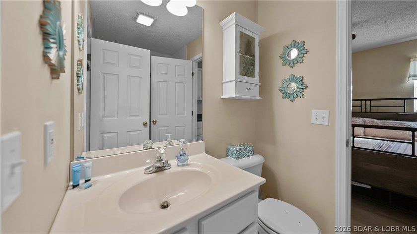 This fully furnished lakefront home is perfect for full-time - photo 26