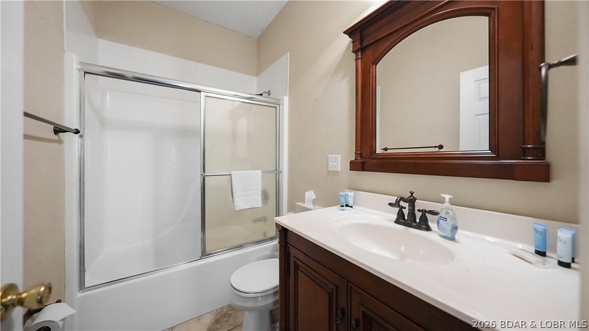 This fully furnished lakefront home is perfect for full-time - photo 33