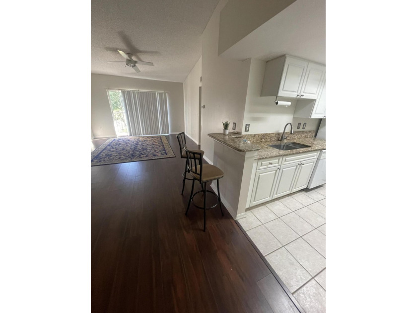 Welcome to your three-bedroom, two-bathroom waterfront - photo 5