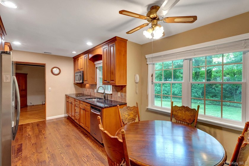 Welcome to this beautifully maintained cedar and brick-sided - photo 13