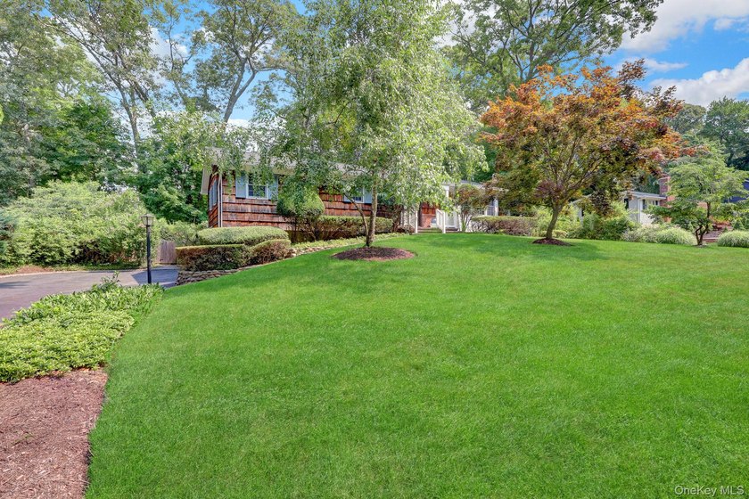 Welcome to this beautifully maintained cedar and brick-sided - photo 32