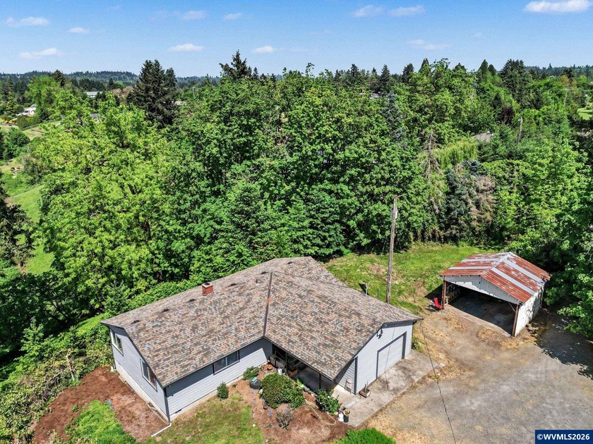 Perched above the Willamette River in Canby, this rare 7.46-acre - photo 2